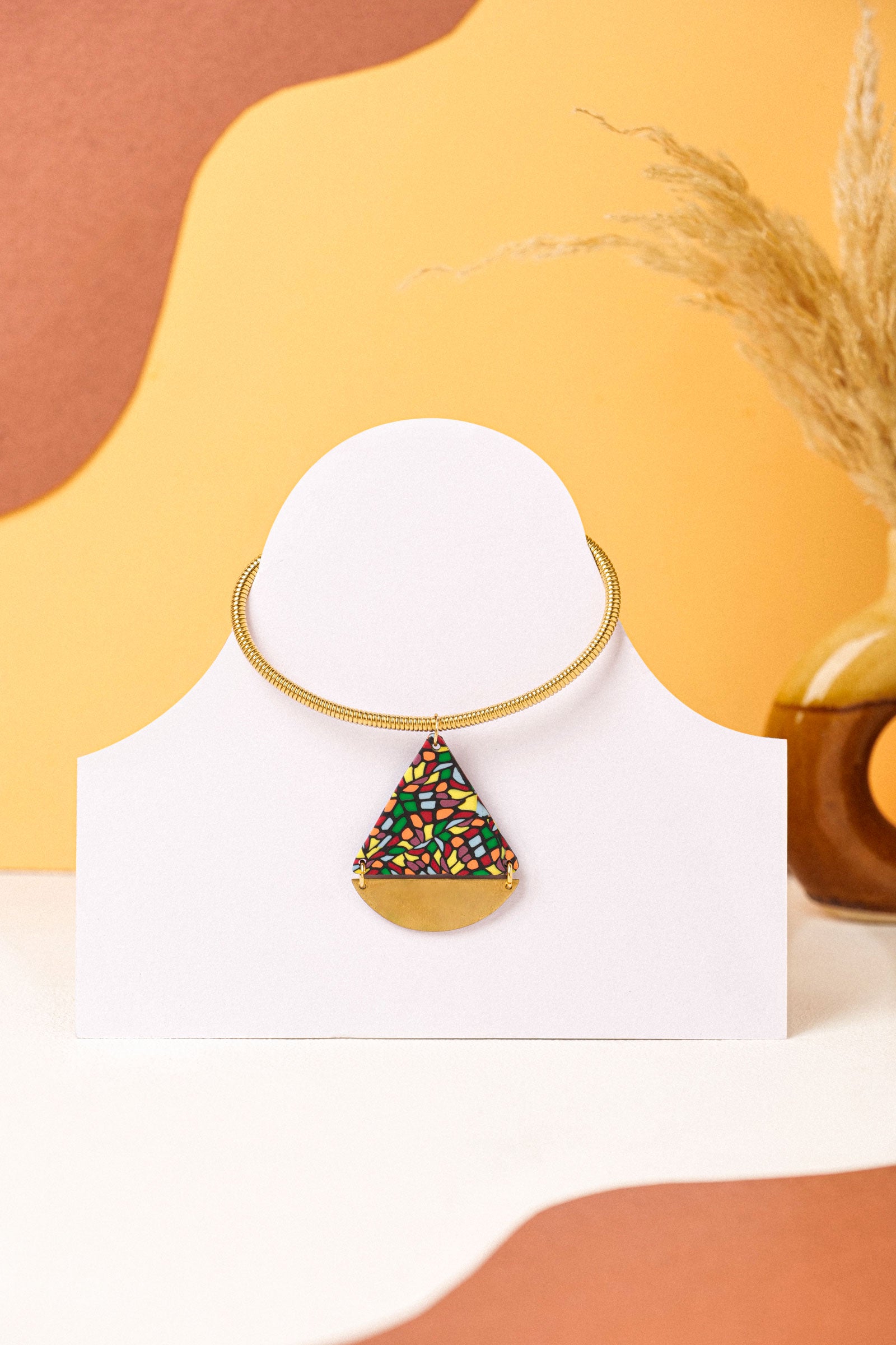 Triangle necklace with mosaic pattern and gold detailing. Your showstopper piece.