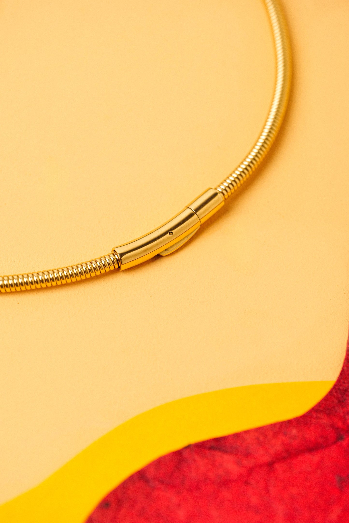 Triangle necklace with mosaic pattern and gold detailing. Your showstopper piece.