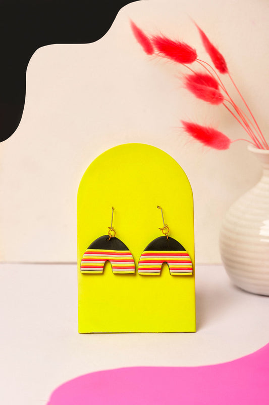 Neon striped clay arches for everyday party mode. Berlin colour, wearable shape.